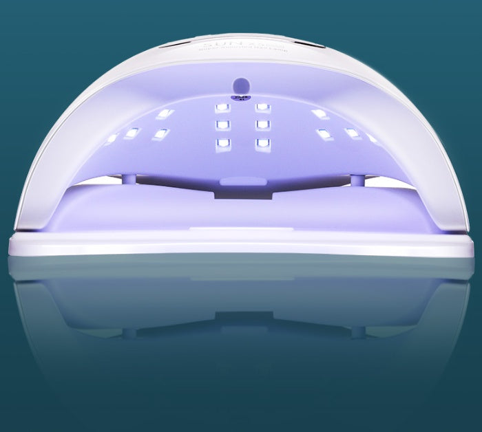 White LED light bulb with a purple glow on a dark background