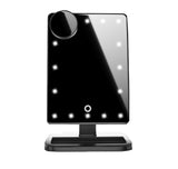 Black makeup mirror with LED lights on a white background