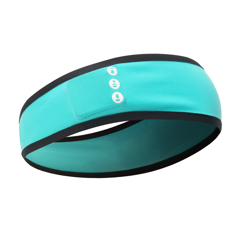 Turquoise headband with black trim on a white background