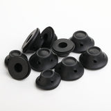 Set of black rubber bungs on a white background