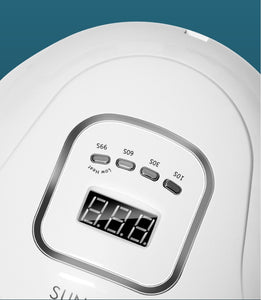 White nail lamp with digital display on a dark blue background