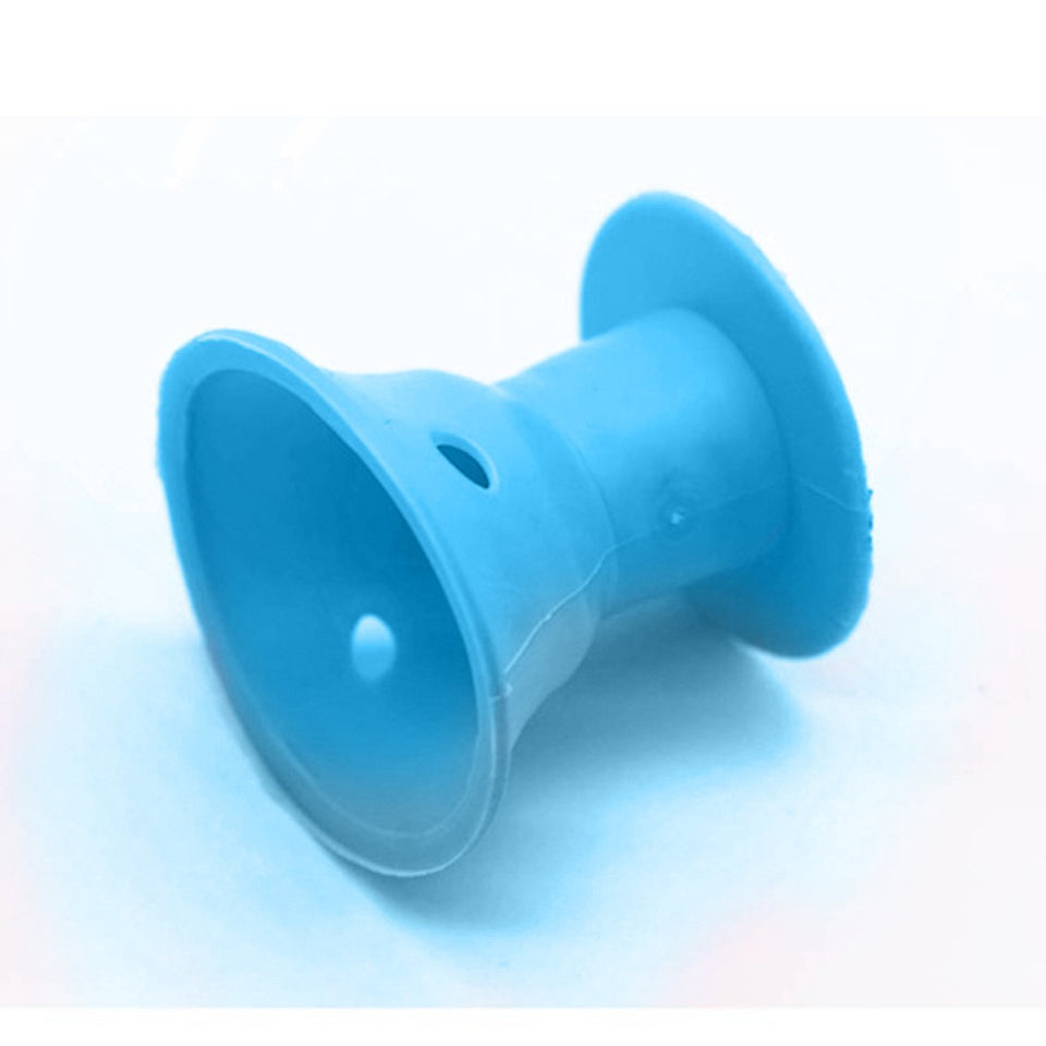 Blue silicone cupping device on a white background
