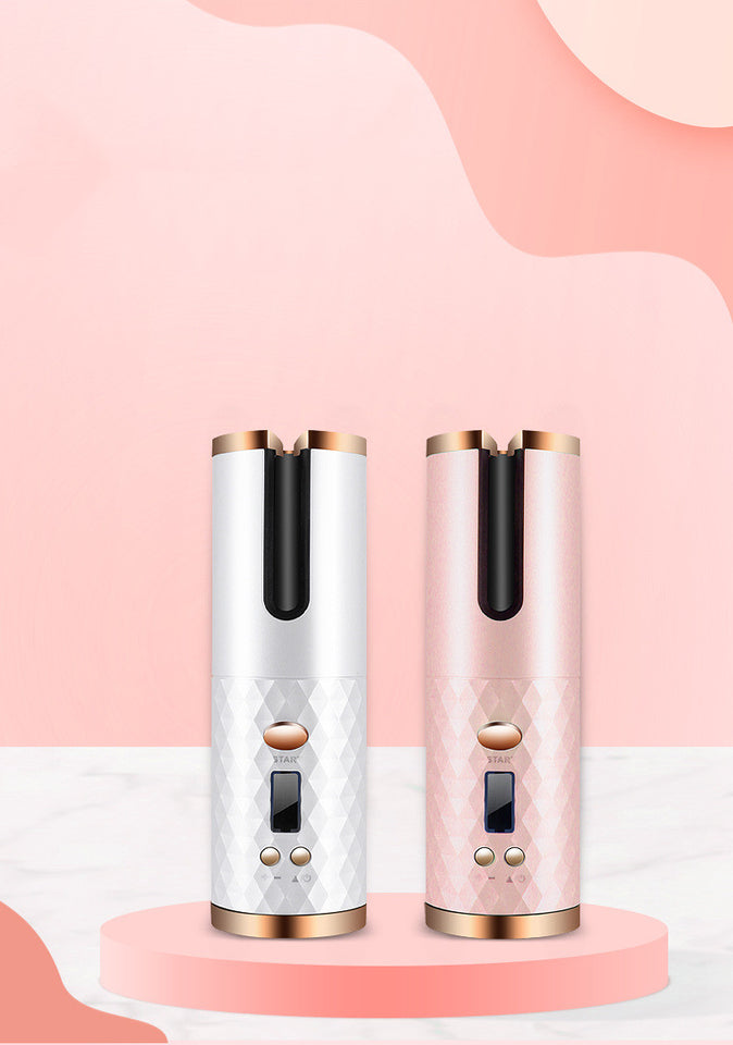 Two electronic devices, one white and one pink, on a pink background