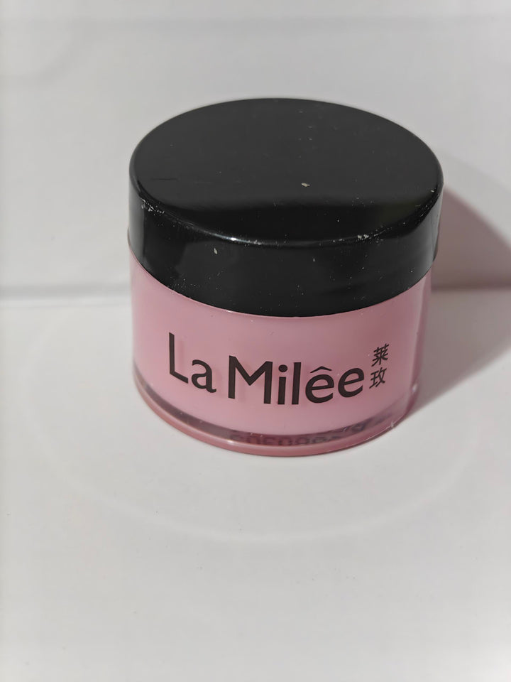 Pink jar with black lid labeled 'La Mileèe' on a white background