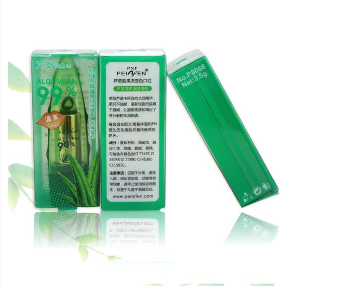 Green aloe vera product packaging with text on a white background