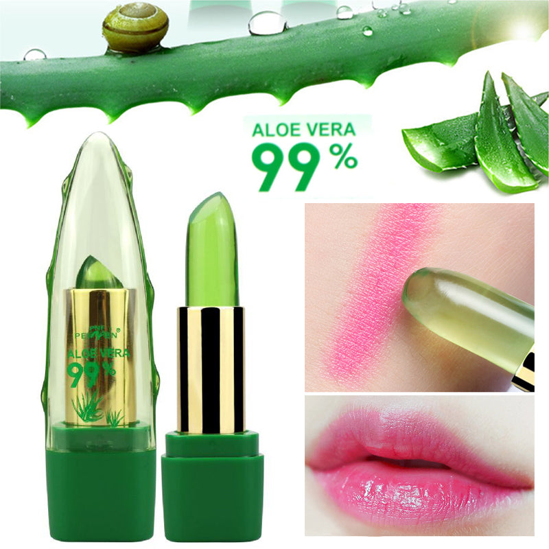 Green aloe vera lipstick with aloe vera leaves and droplets on a white background