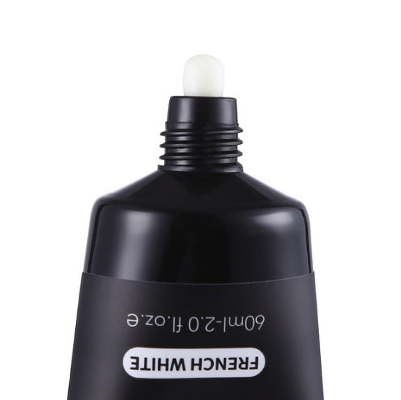 Black bottle labeled 'French White' with a white cap on a white background