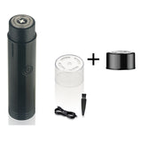 Black electric shaver with accessories on a white background