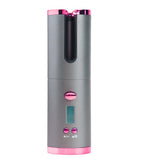 Gray electronic device with pink accents on a white background