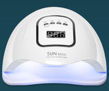 White nail lamp with digital display on a dark blue background