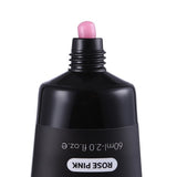 Black cosmetic bottle with pink cap on a white background