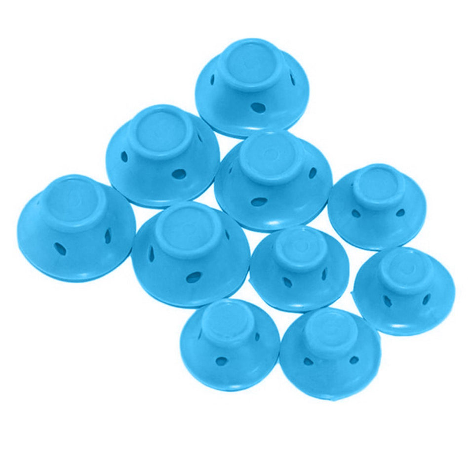 Blue plastic caps with holes on a white background