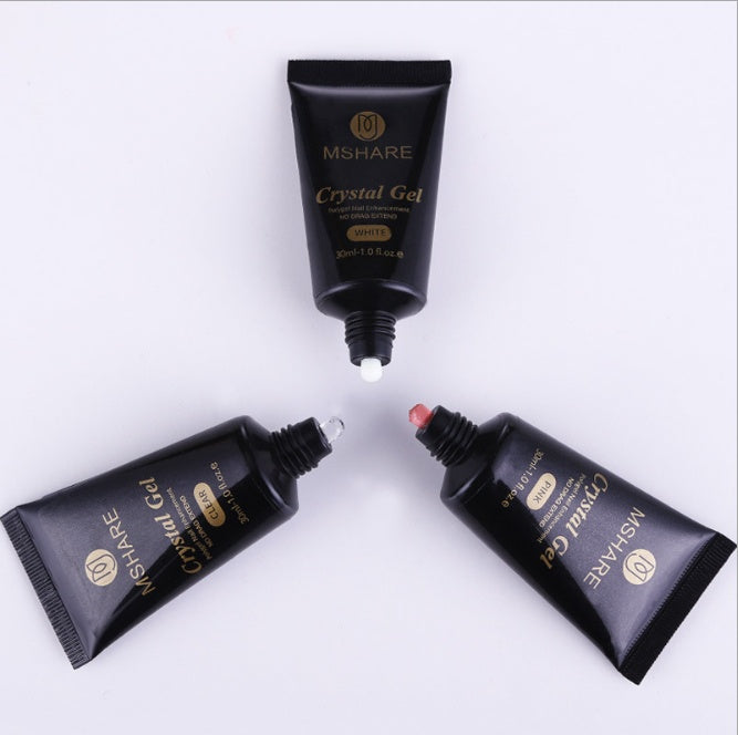 Three black MSHARE Crystal Gel tubes on a white background