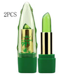 Green aloe vera lipstick with gold cap on a white background