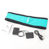 Teal running belt with black accents, speaker, USB cable, and packaging on a white background