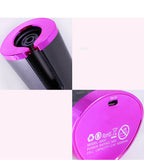 Close-up of a pink and black electronic device with branding and specifications.
