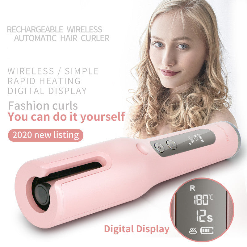 Pink rechargeable wireless automatic hair curler with digital display on a white background