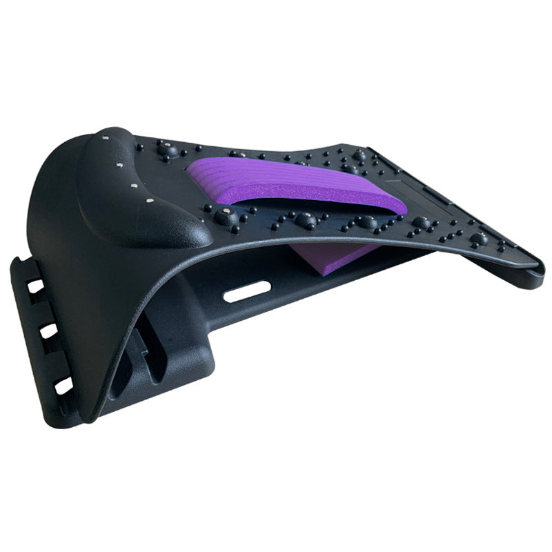 Black and purple plastic component on a white background